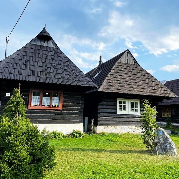 The wooden houses in Orava small village Podbiel. Photo taken in orava region during hot summer day.